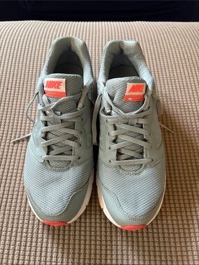 Nike Women's Grey Sneakers with Coral Accents